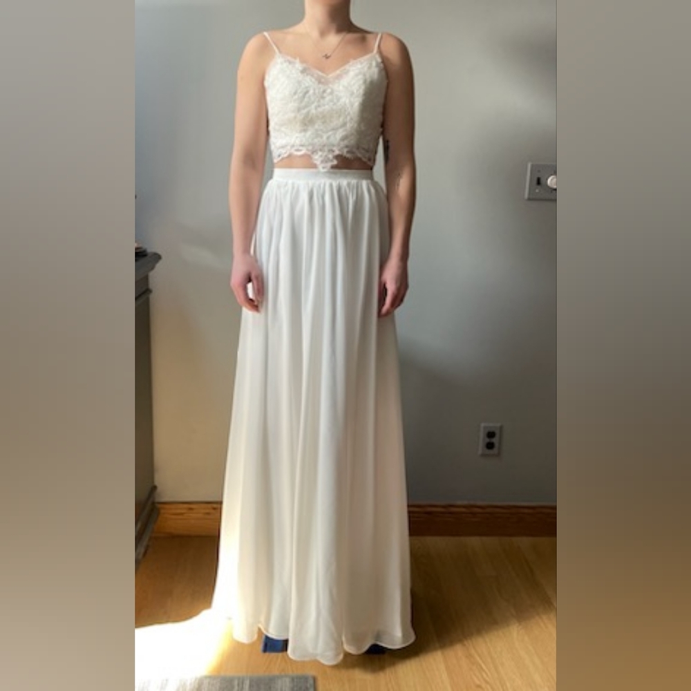 Two piece bridal gown with three different tops. $300 per set or $600 for all.